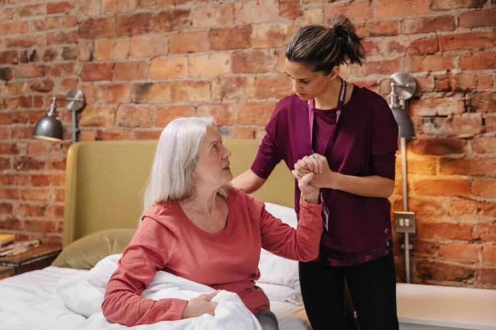 Care Professional assisting a client at home
