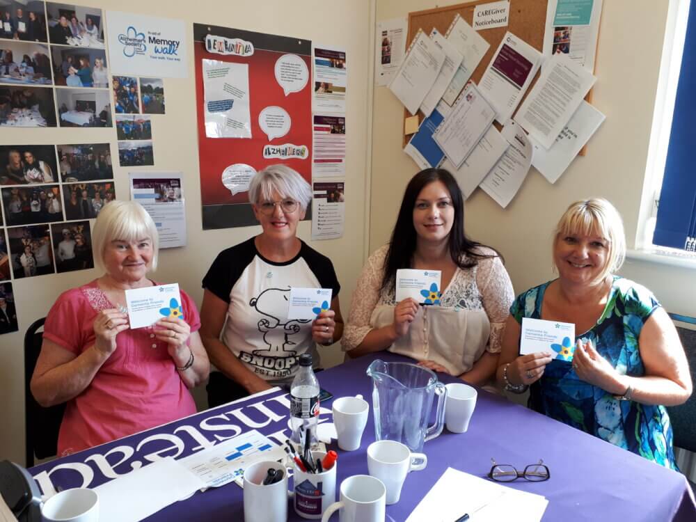 A group of Home Instead Homecare Professionals becoming dementia friends